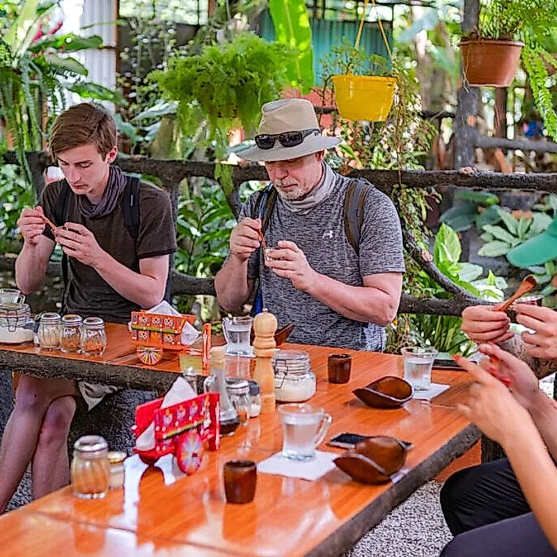 Traditional process of crafting artisanal chocolate on a farm in La Fortuna.