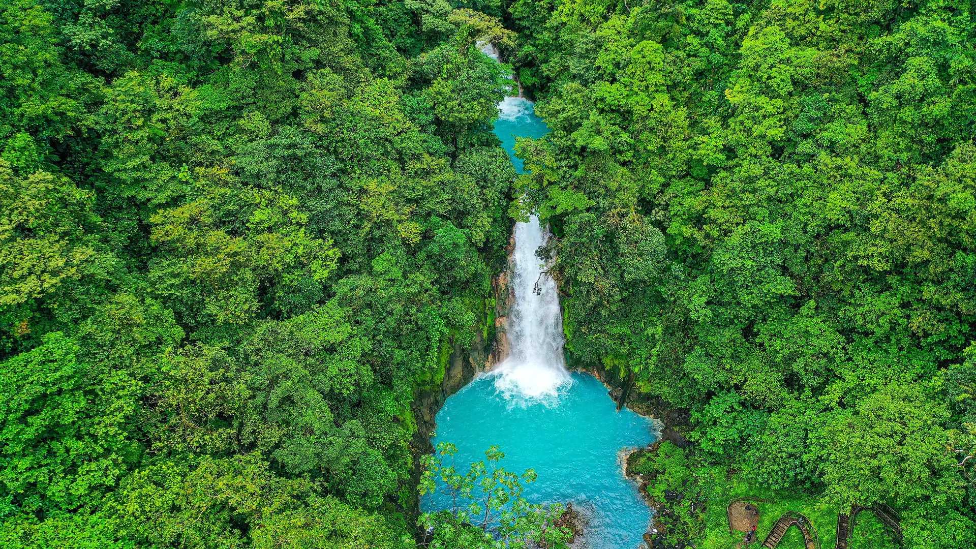 Dreamlike landscape in the tropical rainforest surrounding Costa Rica's bluest river.