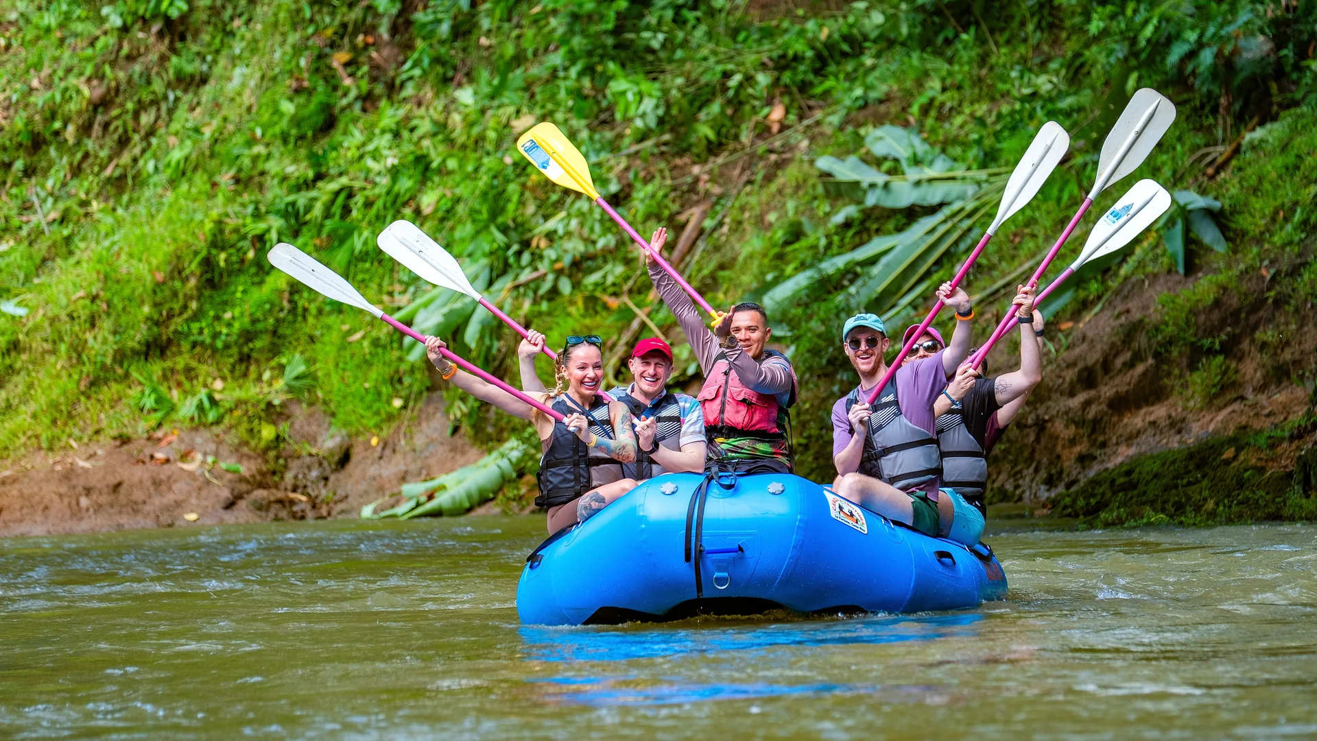 Paddling boat navigating the calm waters of the Safari Float, ideal for wildlife spotting.