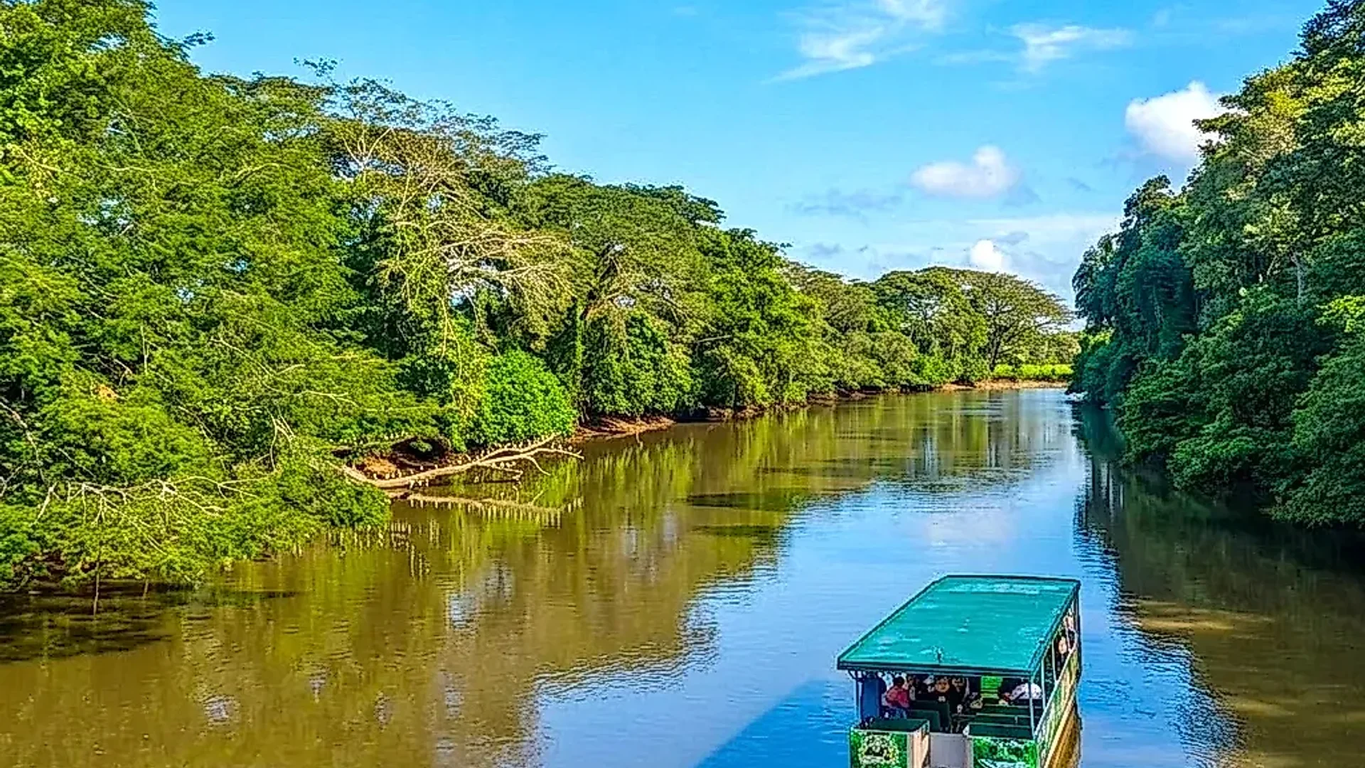 Expedition boat departing for a river safari in the Caño Negro Wildlife Refuge.